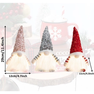 Three glowing Christmas gnomes set with sequins hats and warm LED lights 29cm height