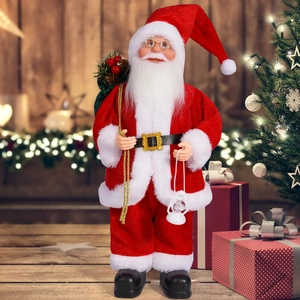 Detail of 12-inch Santa Claus figurine with lantern and gift bag in festive home setting