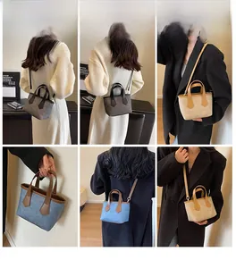 Detailed views of vintage small bucket bags in grey, white, and denim fabric