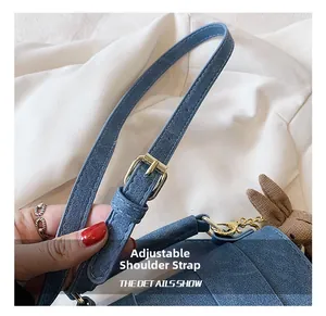 Detail of adjustable shoulder strap with gold buckle and a cute brown bunny charm