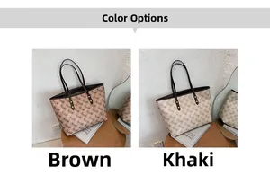 Detail view of brown and khaki large tote bags with classic carriage patterns