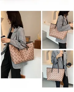 Three-way style display of large tote bag with horse carriage print and brown handles