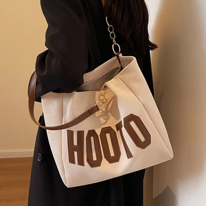 Large beige corduroy tote bag with HOOTO brown leather patch and chain strap