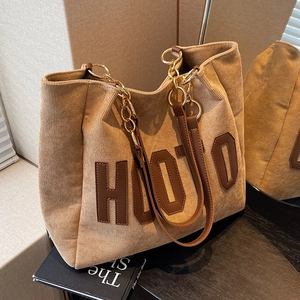 Brown corduroy tote bag with HOJO leather patch and chain strap for daily use