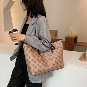 Large tote bag with carriage print and brown leather straps for autumn work fashion