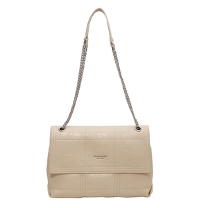 Beige quilted leather crossbody bag with silver chain strap and flap closure