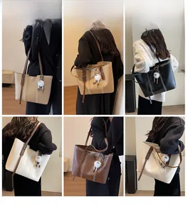 Detailed views of multi-color large tote bags with plush pendants for daily commuting