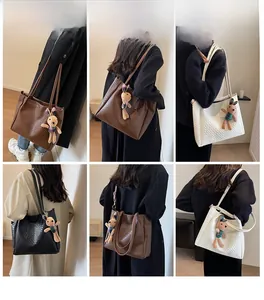 Collage of model carrying large tote bags in black, brown and white with rabbit charms