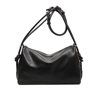 Minimalist black PU leather pillow shoulder bag with large capacity and knotted side detail