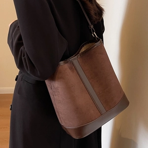 Vintage brown suede and leather bucket bag with slim shoulder strap for women