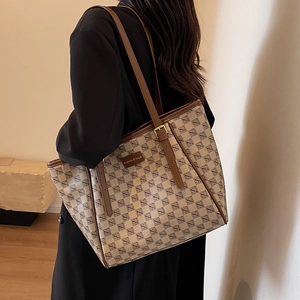 Large capacity checkered tote bag with brown leather handles and fashion logo plaque