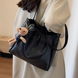 Large black woven tote bag for women with shoulder strap and cute rabbit charm