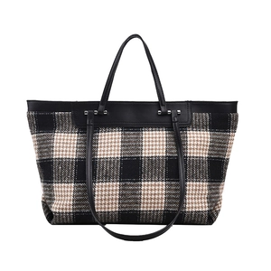 Large capacity plaid canvas tote bag with black leather handles and metal hardware