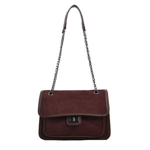 Deep brown quilted crossbody bag with red stitching and elegant chain strap in suede