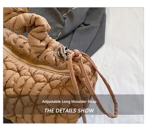 Detail of adjustable shoulder strap and quilted nylon texture on caramel brown bag