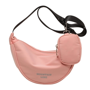 Pink nylon half-moon crossbody bag with wide strap and matching mini pouch kit