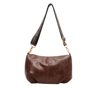 Retro large brown dumpling shoulder bag with vintage texture and ethnic woven strap