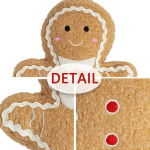 Coussin peluche bonhomme de pain d'épices en laine d'agneau bouclée avec broderie blanche