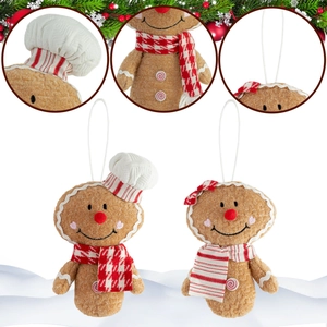 Detail view of plush gingerbread man and woman ornaments with festive hats and scarves
