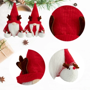 Pair of Nordic Christmas gnomes with reindeer feet and antlers made of red corduroy fabric