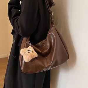 Women Vintage PU Leather Shoulder Bag Large Capacity Hobo Bag With Star Plush Charm Versatile Crossbody Bag For Daily Use