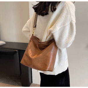 Brown large capacity tote bag with vintage jacquard wide strap for casual crossbody use