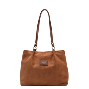 Brown suede tote bag with heart embossing and leather straps on white background