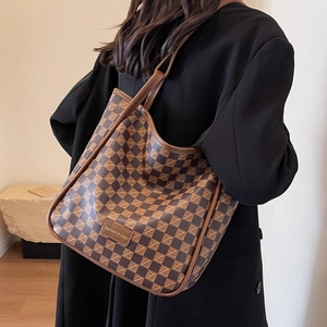 Large capacity checkerboard tote bag in brown and khaki with adjustable shoulder straps