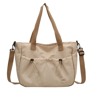 Minimalistische beige Canvas-Einkaufstasche mit Kordelzugtaschen und Schultergurt