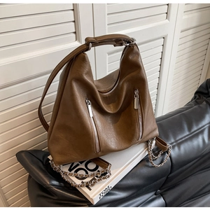 Brown vintage PU leather hobo bag with dual vertical zippers and chain detail