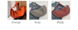 Détails des grands sacs hobo bandoulière en toile couleurs orange, gris et rose