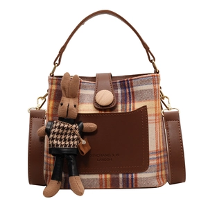 Plaid wool bucket bag with brown leather trim, top handle and cute rabbit charm