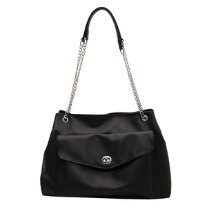Large black faux leather tote bag with silver chain strap and front flap pocket for commuting
