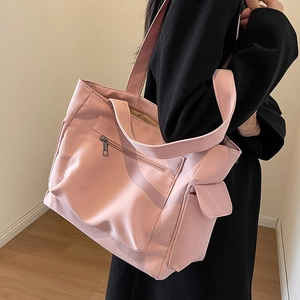 Pink large capacity canvas tote bag with side pockets for women commute and casual use