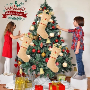 Three-piece plush reindeer Christmas stocking set with golden antlers for holiday decor