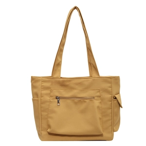 Minimalist ginger yellow large canvas tote bag with front zipper and side pockets