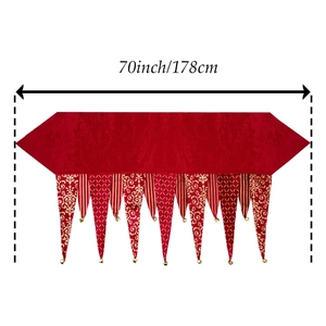 70-inch red Christmas table runner with golden bell accents and festive stripes