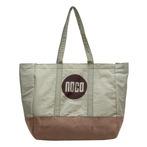 Sac fourre-tout en toile bicolore vert sauge et marron avec logo NOCO au centre
