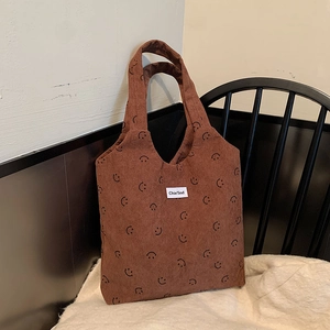 Sac cabas en velours côtelé marron avec motifs sourires noirs, grand sac porté épaule