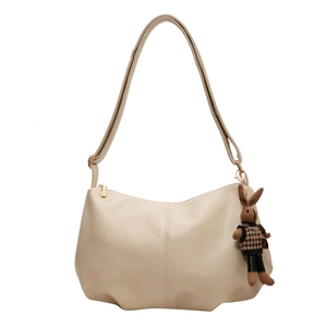 Creamy leather hobo bag with pleated cloud design and a cute bunny charm accessory
