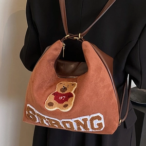 Retro brown large capacity backpack with textured finish and cartoon bear embroidery