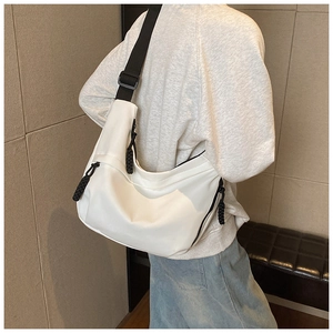 Detail of white nylon half-moon crossbody bag with adjustable wide black strap