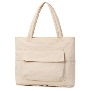 Minimalist beige nylon tote bag with large front pocket for daily commute and casual use