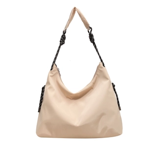 Beige large capacity Oxford cloth hobo bag with braided black and white shoulder strap