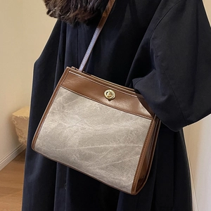 Retro large capacity tote bag with brown leather trim and golden twist lock closure