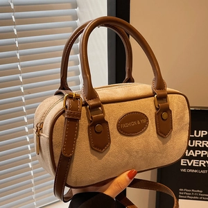 Retro camel suede Boston bag with brown leather handles and adjustable shoulder strap