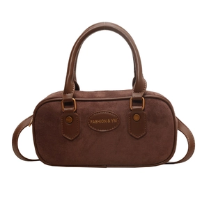 Retro brown suede crossbody pillow bag with top handle and vintage metal hardware