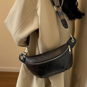 Fashionable black crescent crossbody chest bag with colorful jacquard wide strap