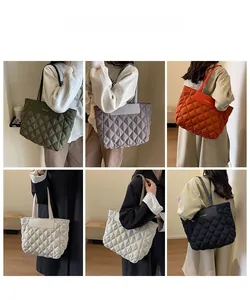 Detailed grid view of quilted puffer tote bags in army green, grey, orange and black colors