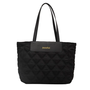 Large black quilted tote bag with golden lettering and stylish double handles for commuting